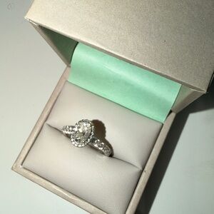 Diamond ring with pave band and halo